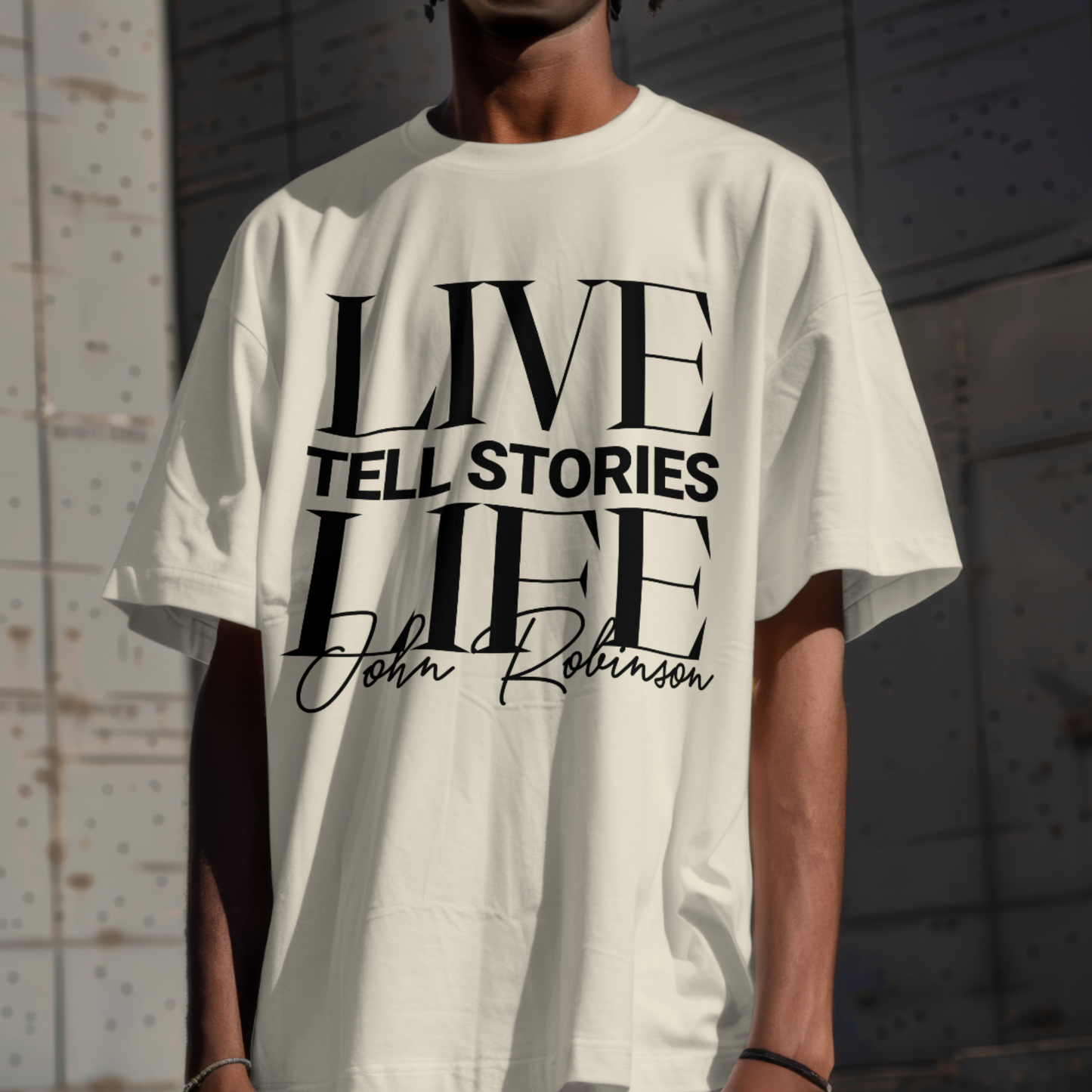 0... John Robinson’s Storyteller Tee